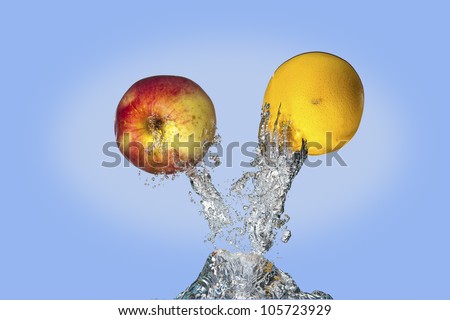 Fruit shooting out of water.