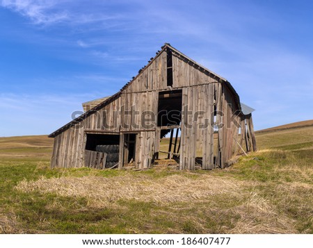 An old run down barn in a field near Potlach, Idaho.
