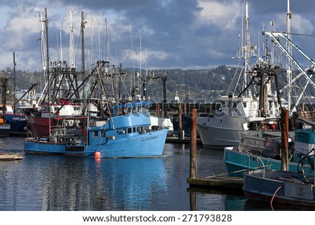 Newport, Oregon USA-March 31, 2015. Commercial  and private fishing boats docked at the historic bay front in Newport, Oregon.