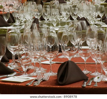 tables set for formal dinner party
