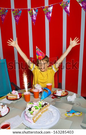 Boy going to eat cake in his birthday