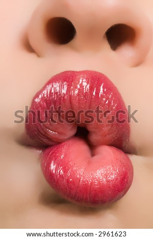 Close up shot of young woman making her lips cupid\'s bow