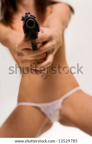 stock photo Sexy naked woman with gun