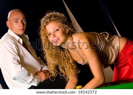 female and male models at night club interior