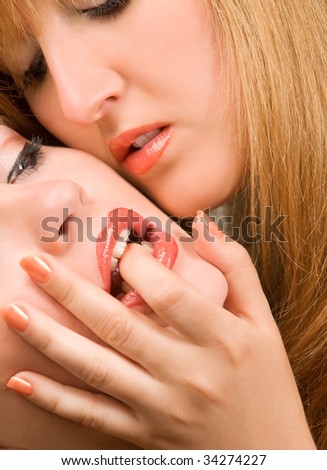 Two lesbian girls performing erotic act