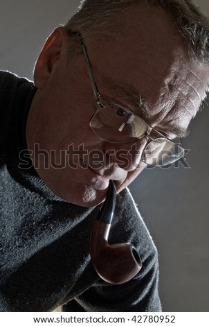 Good mid-aged man with pipe portrait