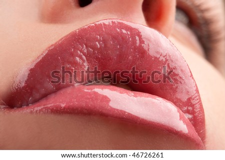 Perfect shiny woman\'s lips closeup