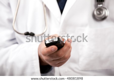 Male doctor with mobile phone