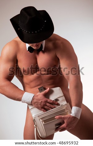 stock photo Muscular naked male stripper with purse