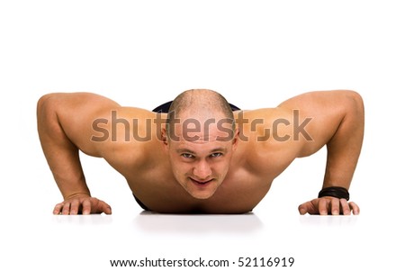  Front view of strong handsome man doing pushups as bodybuilding