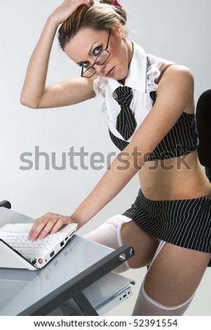 stock photo Beautiful sexy secretary wearing very short skirt pretending