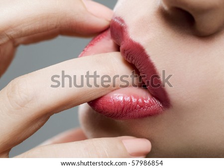 Young model sucking her finger