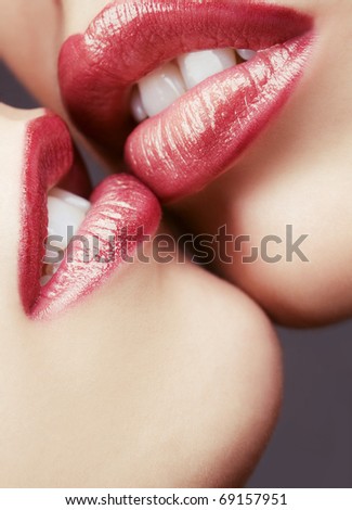 Beautiful female lovers kissing closeup