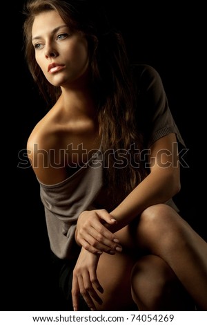 Perfect young model portrait in dark tones