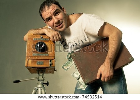 Conceptual  photo for microstock photography, making money by camera shooting