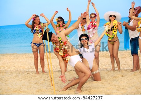 stock photo Beach wedding of happy newlywed couple have fun doing the 