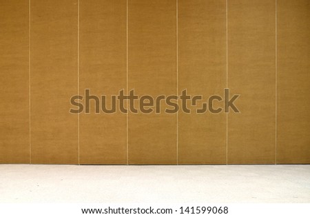empty brown wall and carpet floor