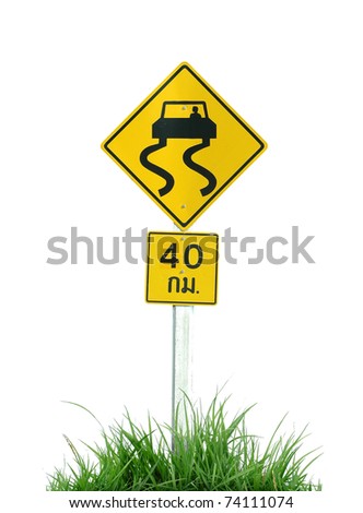 Slippery Road Sign. stock photo : Yellow slippery road sign and green grass isolated on white