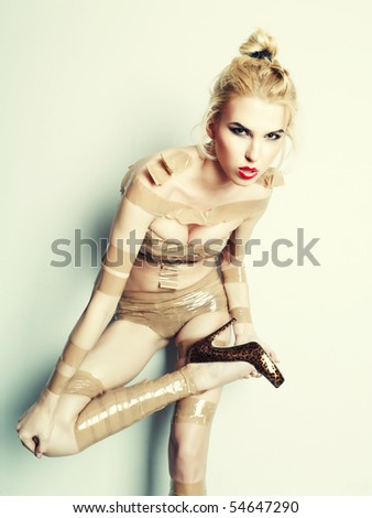 girl wrapped in duct tape