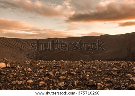 Mars surface landscape with explorers in distance