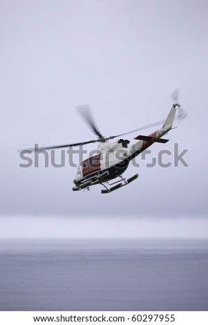 Rescue Helicopter flying over sea
