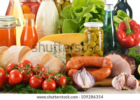 Composition with variety of grocery products including vegetables, fruits, meat, dairy and wine