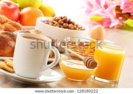 Breakfast Including Coffee, Bread, Honey, Orange Juice, Muesli And Fruits