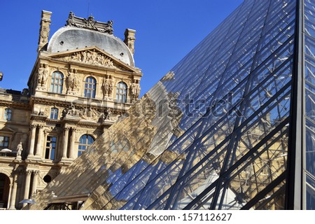 PARIS, FRANCE - SEPTEMBER 23: Louvre Museum in Paris, France on September 23, 2013, major touristic attraction in Paris and the world\'s most visited museum, with more than 8 million visitors each year