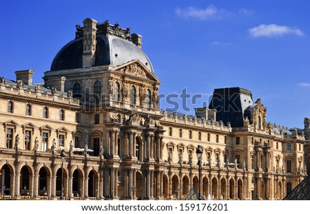 PARIS, FRANCE - SEPTEMBER 23: Louvre Museum in Paris, France on September 23 2013, major touristic attraction in Paris and the world\'s most visited museum, with more than 8 million visitors each year