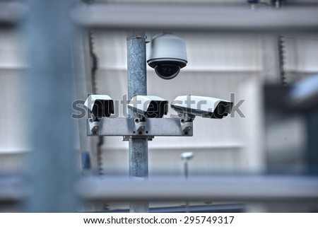 High tech overhead security camera system installed in guarded industrial area.