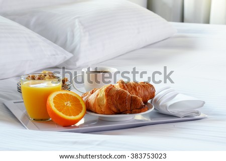 Breakfast in bed in hotel room. Accommodation.