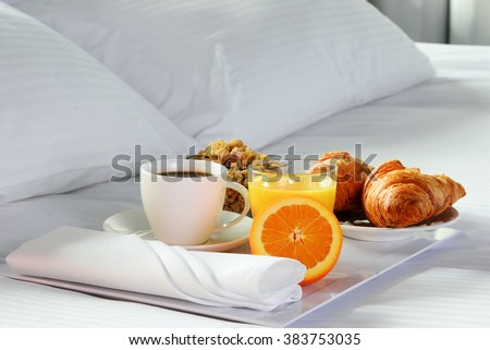 Breakfast in bed in hotel room. Accommodation.