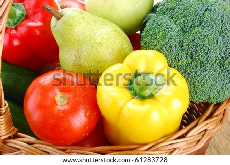 Vegetables and fruits in wicker basket