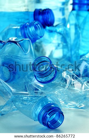 Composition with plastic bottles of mineral water. Plastic waste