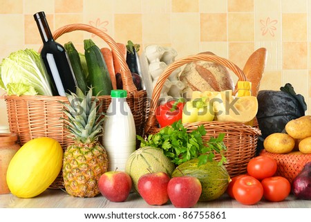 Groceries in wicker basket on kitchen table