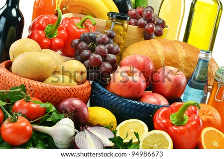 Composition with groceries. Vegetables, fruits, wine and bread.