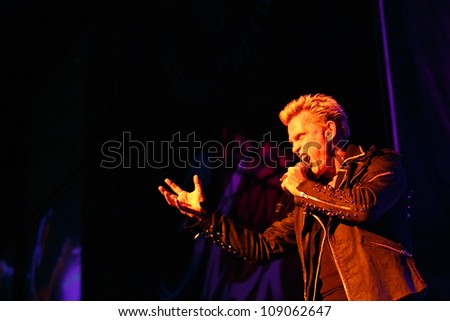 FARO, PORTUGAL - JULY 21: Billy Idol performs onstage at the International Motorcycle Meeting JULY 21, 2012 in Faro, Portugal.