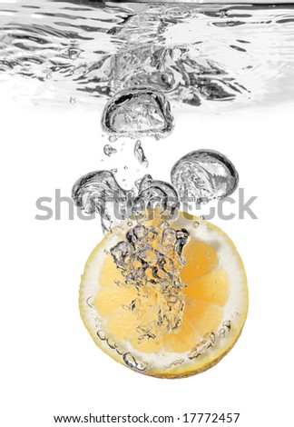 lemon splash in water isolated n white