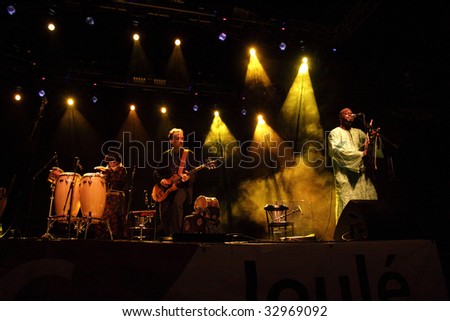 LOULE, PORTUGAL - JUNE 27:Justin Adams and Juldeh Camara performs onstage at Festival Med June 27, 2009 in Loule, Portugal.