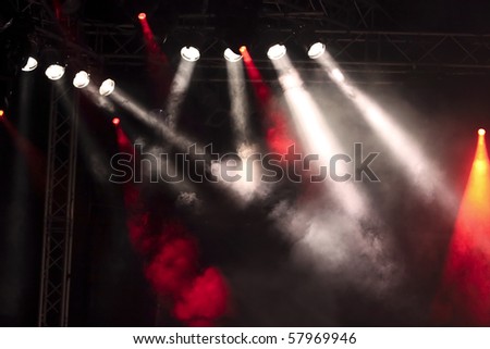 colorful lights and smoke on a stage