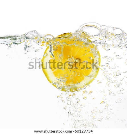slice of lemon in water isolated light grey