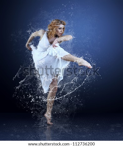 Dance of ballerine around water splashes and drops