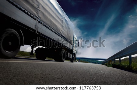 Beautiful View With Truckcar On The Road Under Sky With Clouds