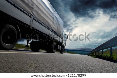 Beautiful view with truckcar on the road  under sky with clouds
