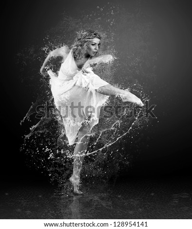Dance of ballerine around water splashes and drops