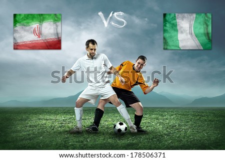 Soccer player stay at field. Game between Iran and Nigeria national teams.