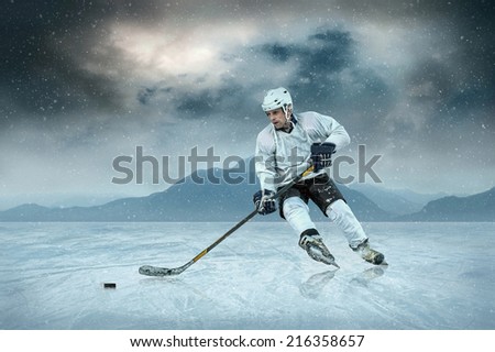 Ice hockey player on the ice, outdoor.