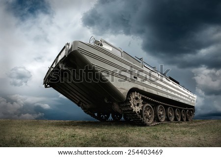 Military tank under sky