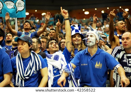PRAGUE, CZECH REPUBLIC - APRIL 5: Iraklis team supporters watch the volleyball game of Final Four CEV Indesit Champions League at O2 Arena on April 5, 2009 in Prague.