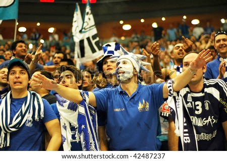 PRAGUE, CZECH REPUBLIC - APRIL 5: Iraklis team supporters watch the volleyball game of Final Four CEV Indesit Champions League at O2 Arena on April 5, 2009 in Prague, Czech Republic.